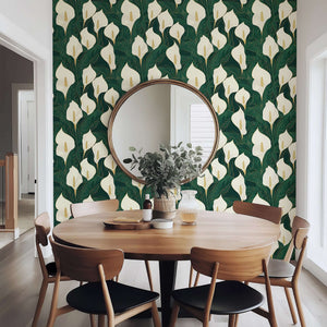 Opulent Calla Lilies wallpaper featuring ivory flowers with golden accents on a deep green background; perfect for modern, contemporary decor.
