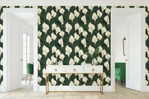 Opulent calla lilies wallpaper featuring ivory flowers and golden details on a deep green background, ideal for modern, contemporary spaces.