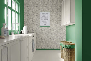 Modern laundry room with "Graceful Lily Lines" monochrome wallpaper featuring elegant lilies on a neutral background.