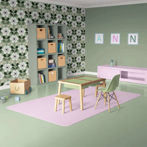 Mid-century modern room with Vintage Sage Blossom wallpaper, featuring white flower patterns on a sage green backdrop.