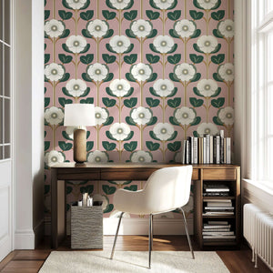 Vintage-inspired "Blush Garden Revival" wallpaper with pink backdrop, white flowers, and green leaves, perfect for stylish interiors.