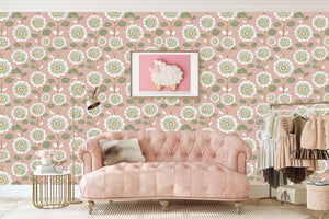 Vintage Daisy Dream wallpaper with white daisies, pink background, and green leaves enhancing a chic retro-style living room.