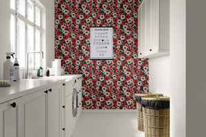 Laundry room with Wild Poppy Passion wallpaper featuring red, black, white flowers, modern design in contemporary setting.