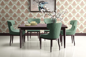 Elegant dining room featuring a vintage floral damask wallpaper in pink, gold, and tan, with sophisticated modern furniture.