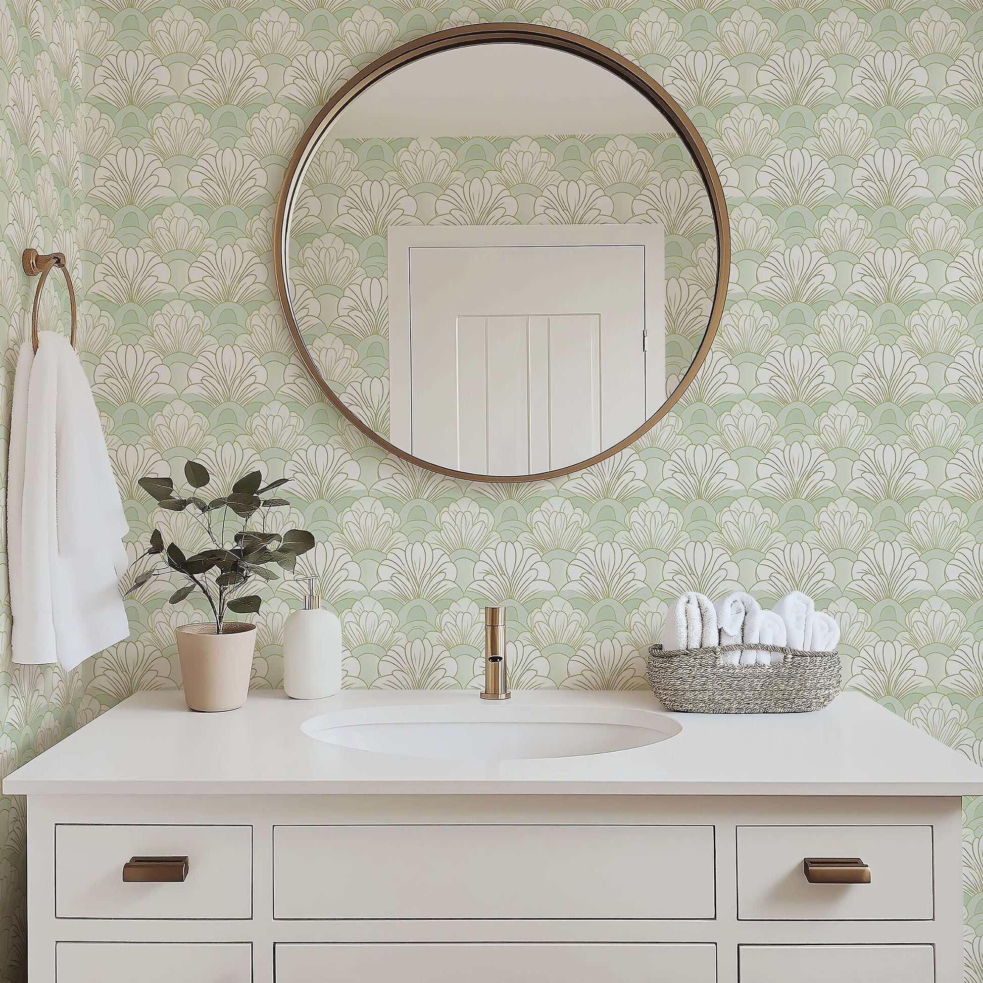 Mint green and white floral art deco wallpaper with fan-shaped design in a modern bathroom, featuring a round mirror and elegant decor.