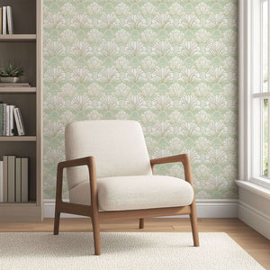 Mint green Art Deco fan floral wallpaper in a modern room with white chair and natural light. Ideal for serene, elegant spaces.