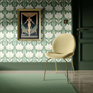 Art deco floral wallpaper featuring jade green and white flowers with a yellow chair, showcasing contemporary garden elegance.