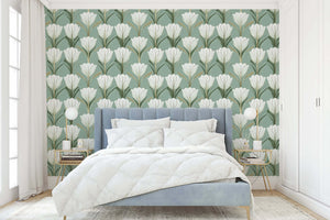 Bedroom with Deco Tulip Harmony wallpaper featuring Art Deco tulip designs in green, gold, and white for a modern, vintage look.