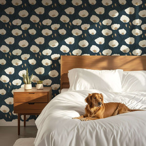 Modern navy floral wallpaper with white poppies behind a cozy bed and relaxed dog, adding elegance to the bedroom ambiance.