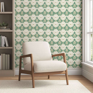 Vintage Garden Luxe wallpaper featuring cream lotus flowers on sage green, perfect for art deco and art nouveau floral decor in a cozy room.
