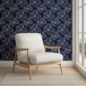 Island Nights Floral Wallpaper with hibiscus flowers on navy, ideal for coastal and tropical accent walls.