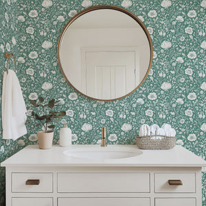 Stylish bathroom with Blooming Wonderland wallpaper featuring white florals on a mint green background, enhancing cottagecore elegance.