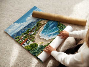 Person rolling out a vibrant wall art print of Malibu's coast with ocean waves and surfers.