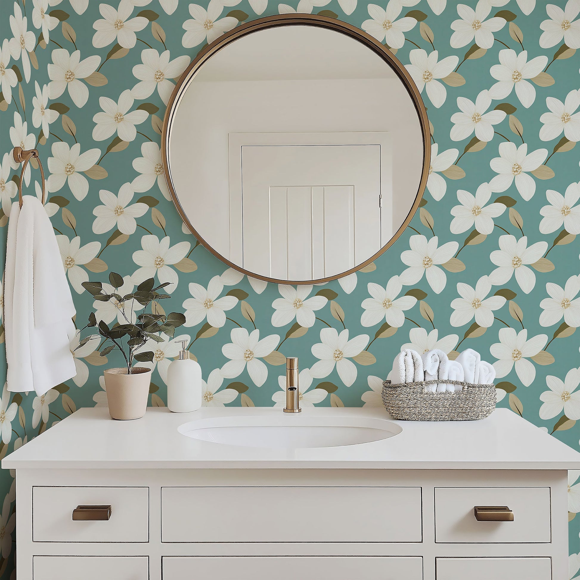 Retro floral wallpaper with ivory blooms on teal background, complemented by a white vanity and mirror, creating a modern, timeless look.