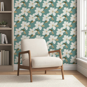 Teal and white floral wallpaper with ivory blooms and tan leaves, creating a retro yet modern and tranquil living room setting.