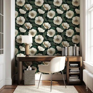 Modern wallpaper with white flowers on deep green background, featuring a contemporary desk setting in light-filled room.