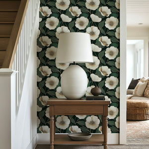Modern dark forest wallpaper with ivory flowers and gold accents, enhancing a stylish interior with contemporary design and elegance.