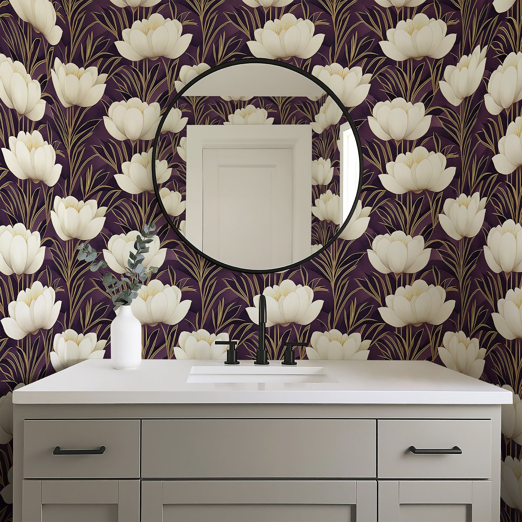 Modern bathroom with Golden Veil Floral art deco wallpaper; ivory and gold flowers on purple background, above gray vanity with round mirror.