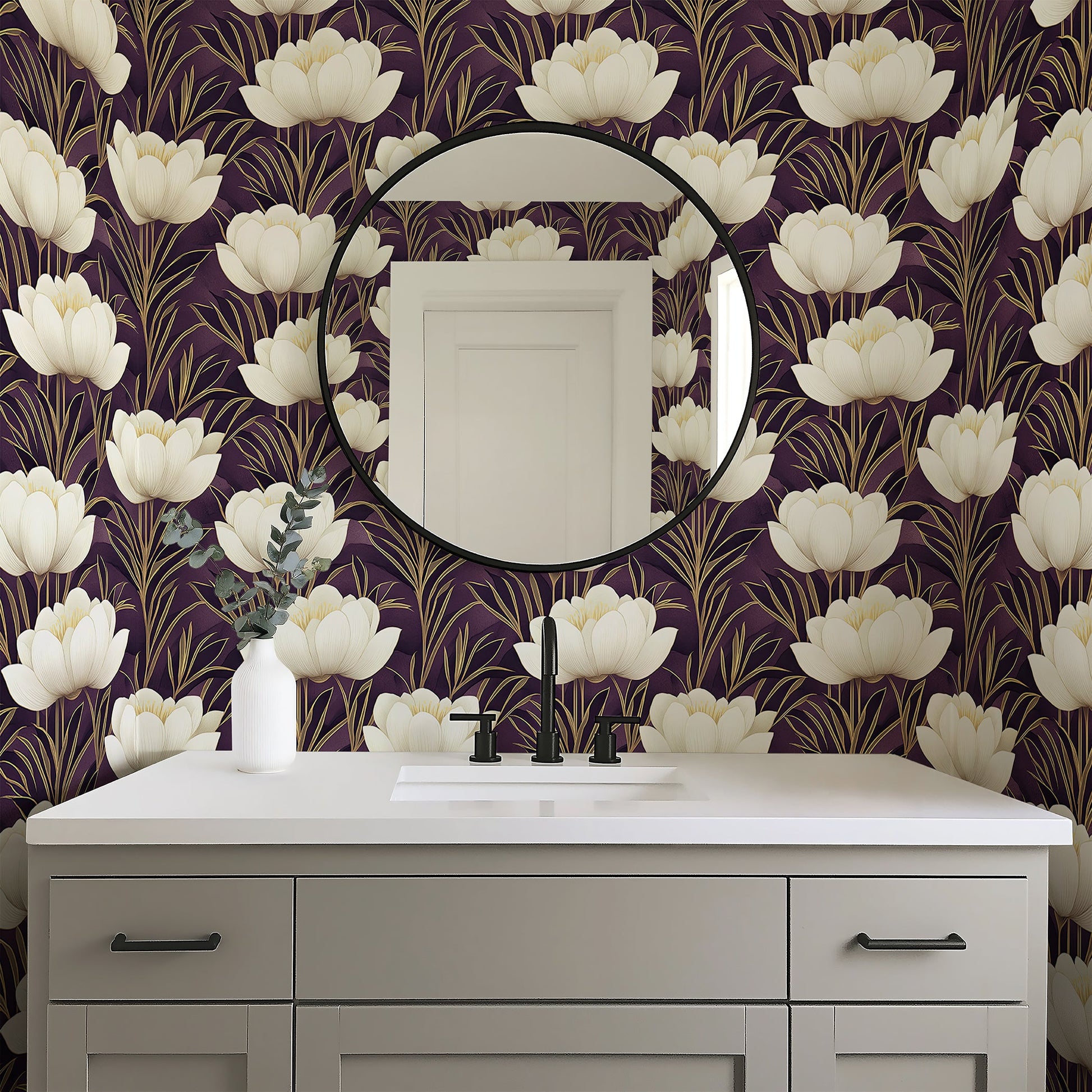 Modern bathroom with Golden Veil Floral art deco wallpaper; ivory and gold flowers on purple background, above gray vanity with round mirror.