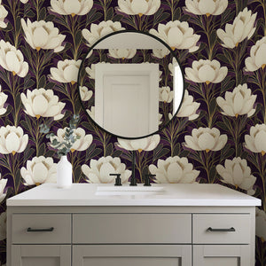 Elegant art deco floral wallpaper with creamy white flowers on purple background, featuring gold accents, enhancing modern decor.