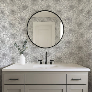 Sophisticated monochrome floral wallpaper featuring chrysanthemums in black and white, enhancing a modern bathroom interior.