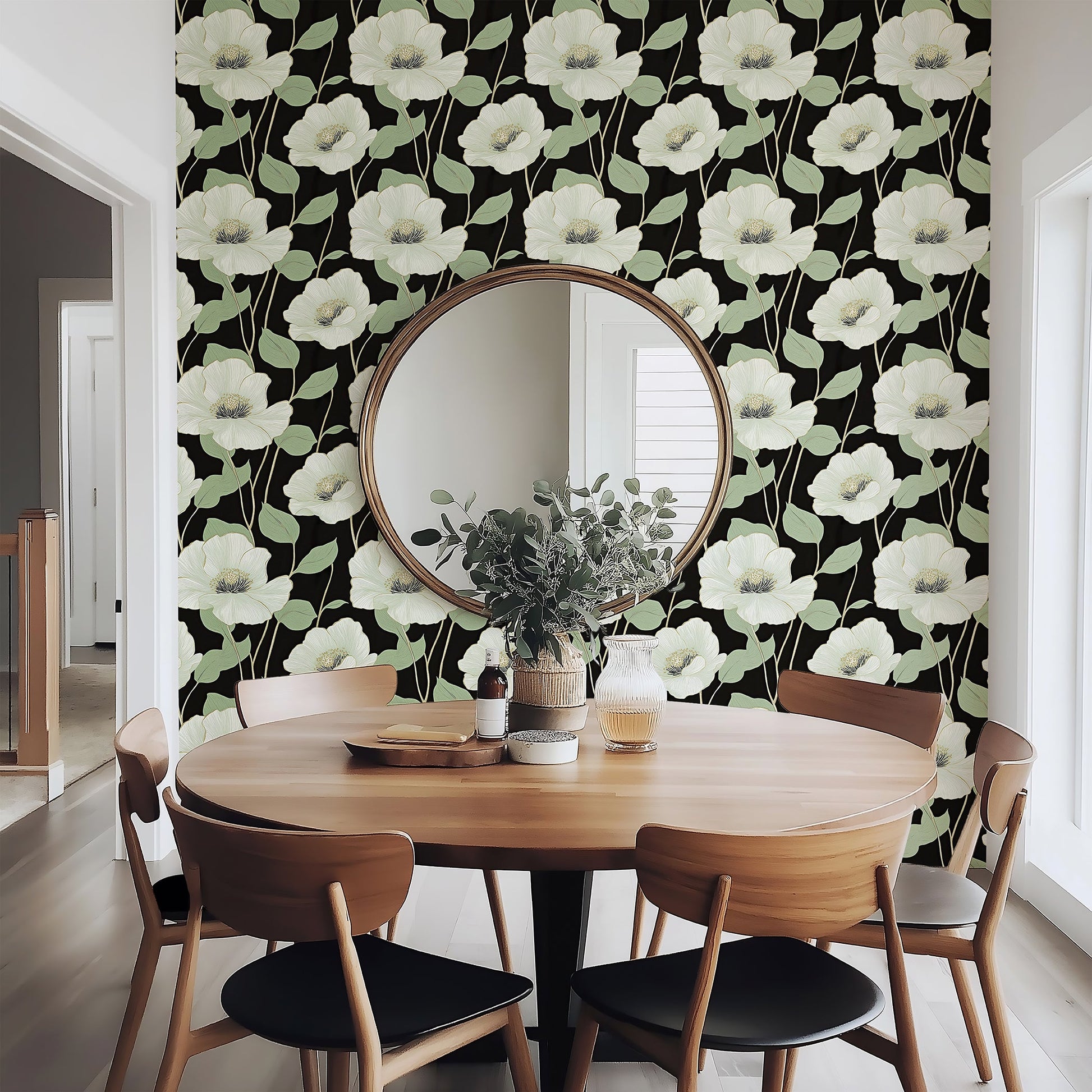 Botanical Luxe on Black Wallpaper featuring floral patterns with white flowers and mint green foliage on a black background in a dining room.