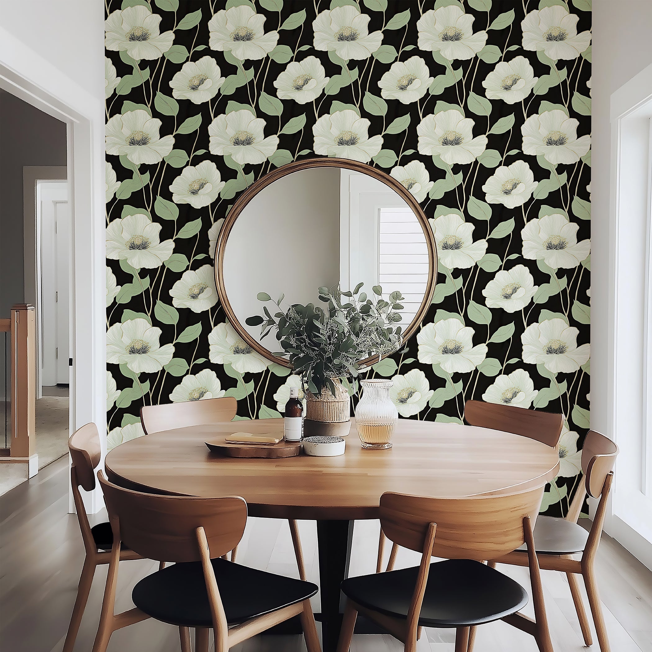 Botanical Luxe on Black Wallpaper featuring floral patterns with white flowers and mint green foliage on a black background in a dining room.