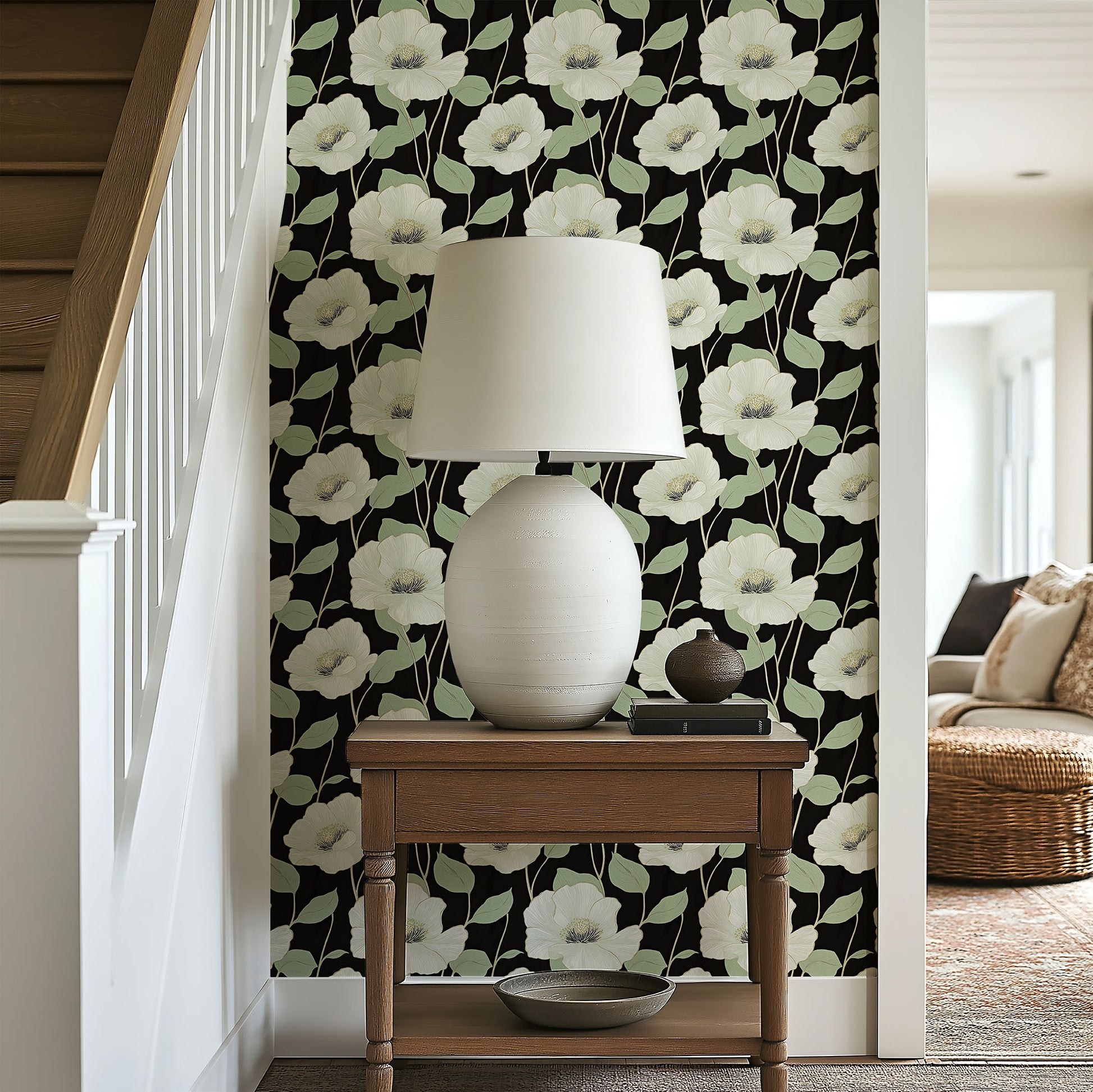 Elegant floral wallpaper with ivory flowers and green foliage on a black background, enhancing chic decor in a modern entryway.