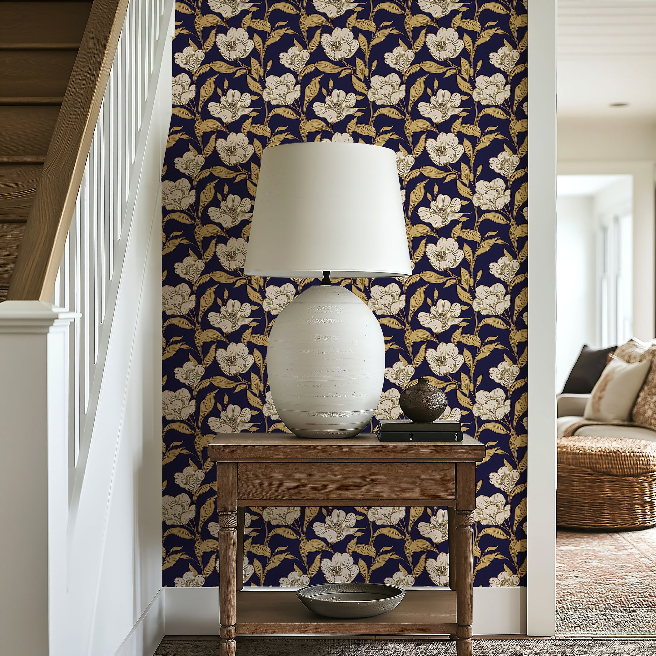 Sophisticated floral wallpaper with ivory petals and gold accents on navy background, enhancing entryway elegance.