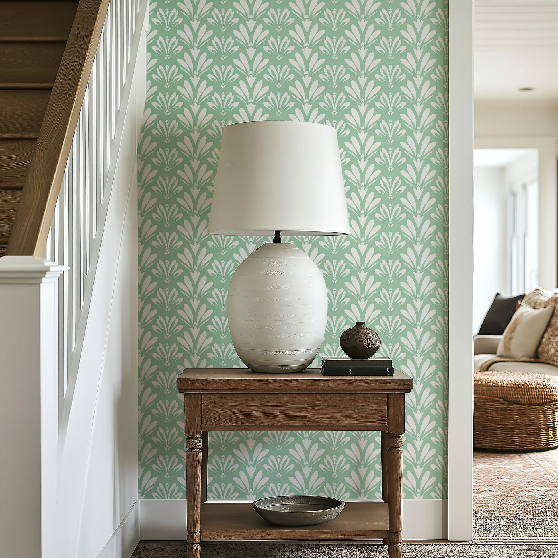 Art Deco mint green wallpaper with white geometric patterns in a modern living room setting, accentuating vintage elegance.