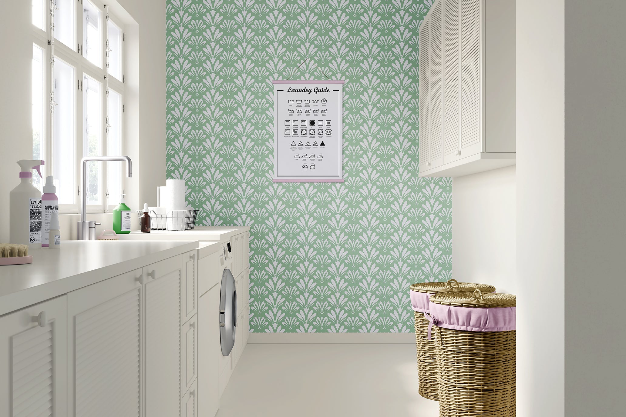 Vintage Art Deco mint green wallpaper with white geometric motifs in a stylish laundry room.