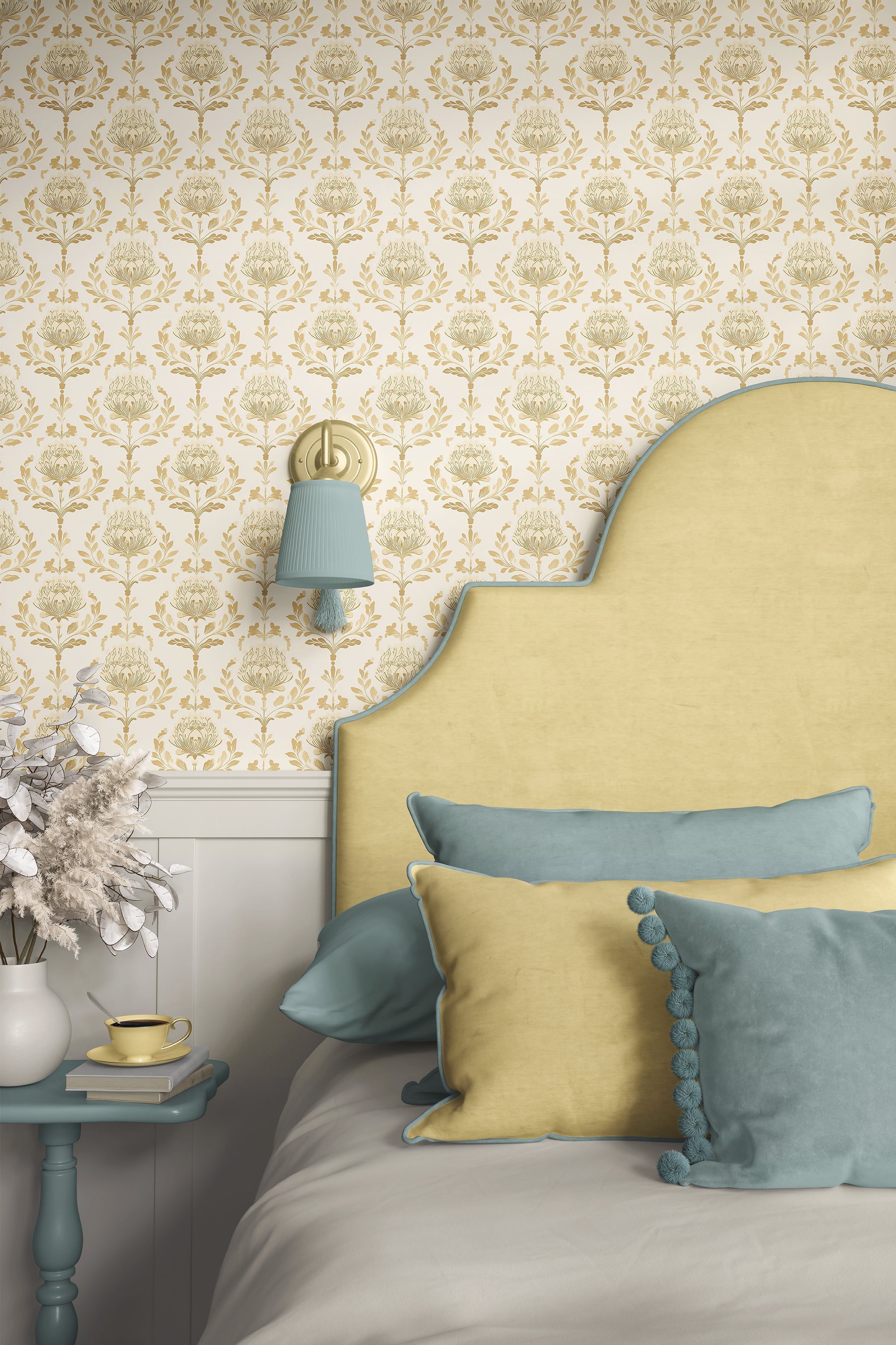 Vintage ivory and peach damask wallpaper with floral pattern enhances a retro bedroom setting featuring blue accents and a soft headboard.