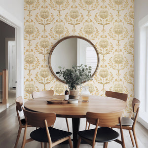 Dining room with Vintage Ivory and Peach Damask wallpaper featuring floral patterns, round mirror, and wooden furniture.