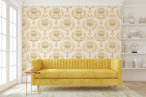 Vintage ivory and peach damask wallpaper with botanical floral pattern in living room featuring yellow sofa and elegant decor.