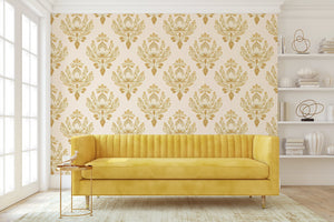 Vintage Floral Allure Wallpaper in golden damask pattern decorates a living room with a yellow sofa, blending retro charm with elegance.