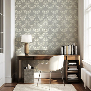 Elegant white laurel wreath wallpaper with gray background in a modern home office setting, enhancing traditional interior decor.