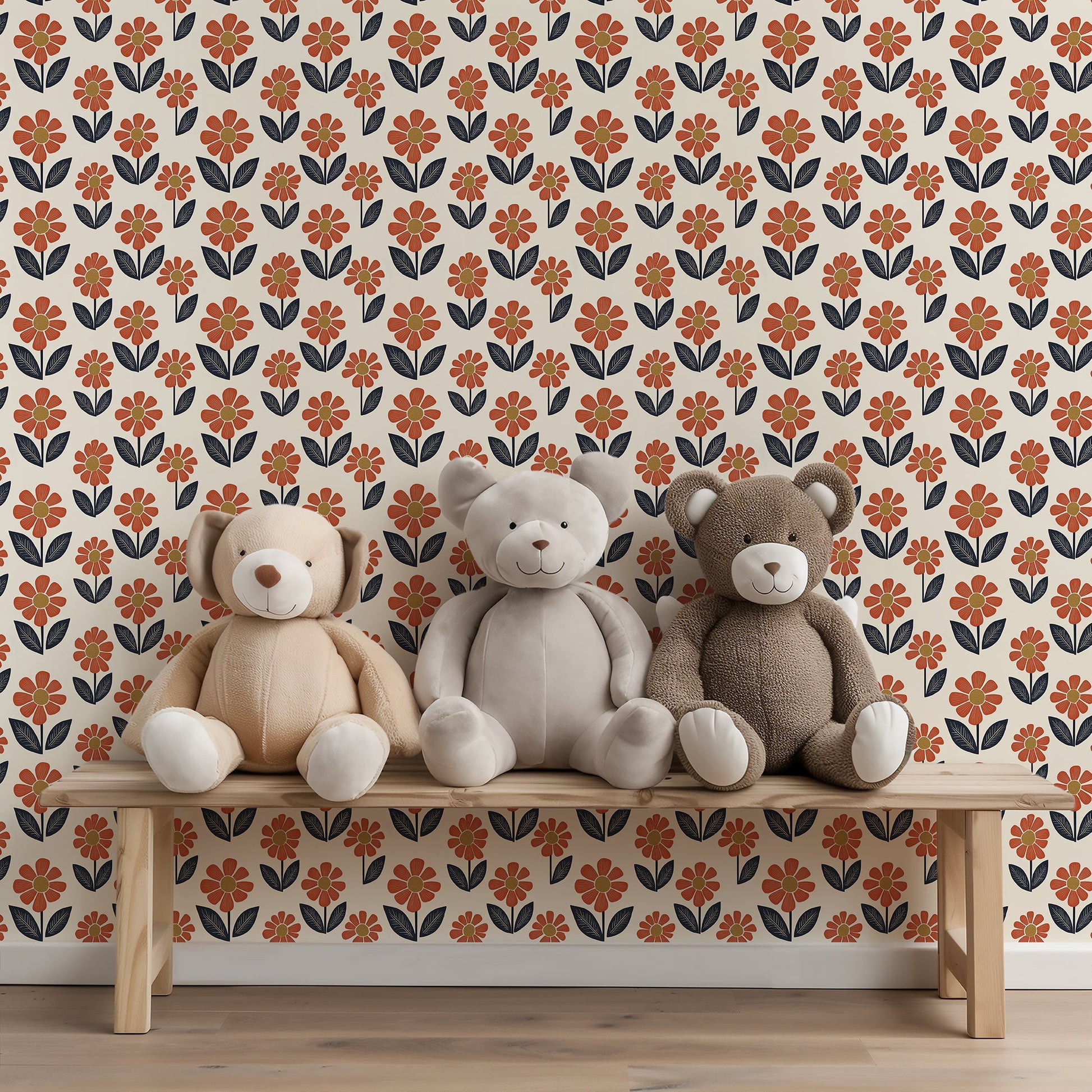 Teddy bears on a bench against retro flower power wallpaper with orange blossoms, navy foliage, and yellow centers. Vintage floral design.