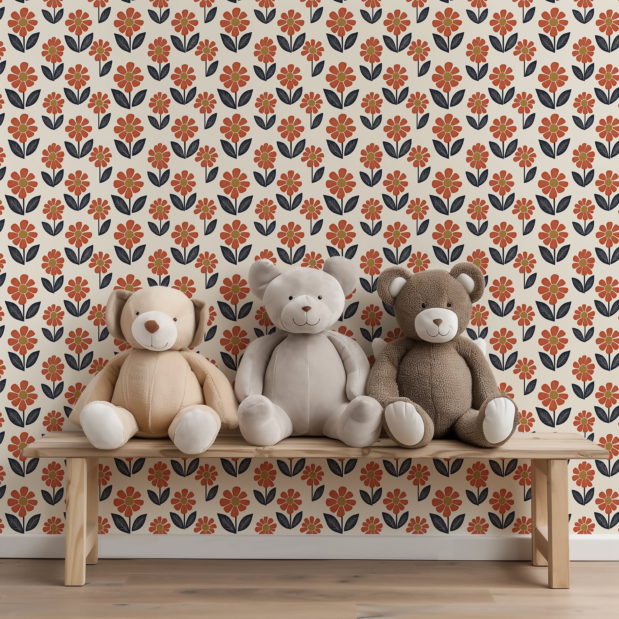 Teddy bears on a bench against retro flower power wallpaper with orange blossoms, navy foliage, and yellow centers. Vintage floral design.
