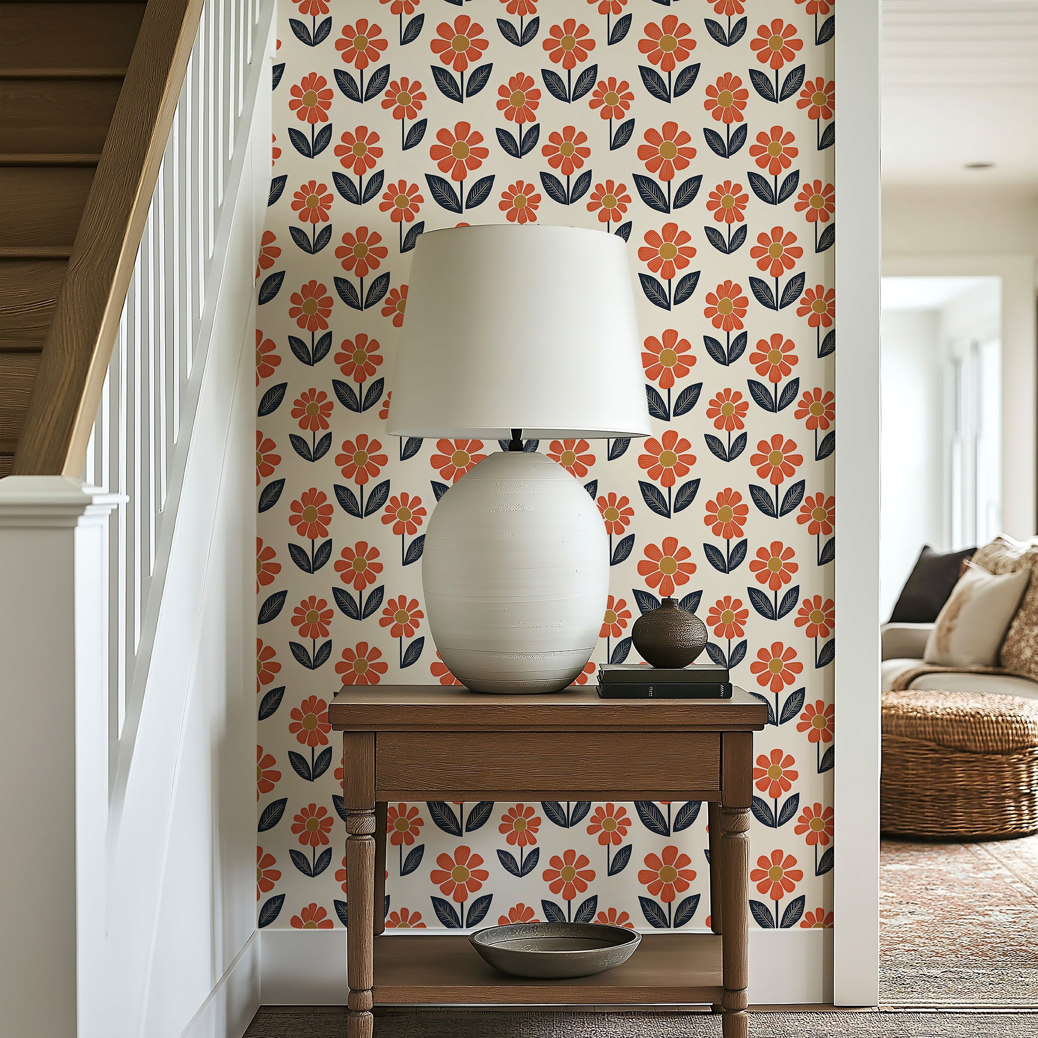 Retro floral wallpaper featuring orange flowers and navy foliage on a feature wall, adding a modern, mid-century vibe to the space.