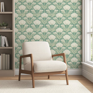 Art nouveau damask wallpaper with ivory flowers on green; complements living room decor with vintage floral style.
