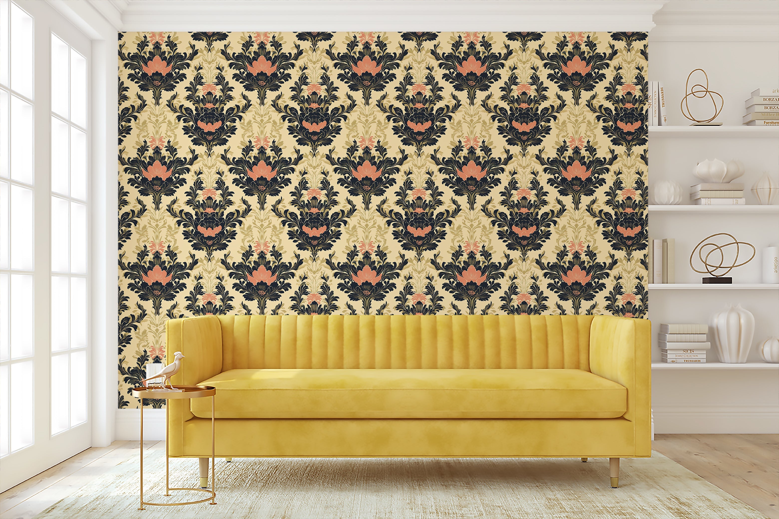 Vintage damask wallpaper with navy, pink, and tan floral patterns on a cream background, featuring an elegant sofa in a stylish room.