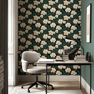 Elegant jungle escape wallpaper with white cream flowers and green palm fronds in a modern home office setting.