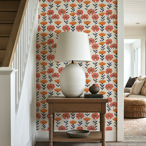 Retro-modern floral wallpaper with vibrant red and orange flowers, perfect for children's rooms and accent walls, adding playful charm.