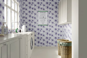 Laundry room featuring Lavender Lineage wallpaper, showcasing floral, monochrome lavender flowers against a white backdrop.