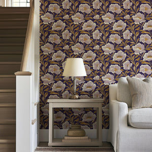 Luxurious floral wallpaper with ivory-white flowers and golden accents on a purple background, ideal for elegant interior design.