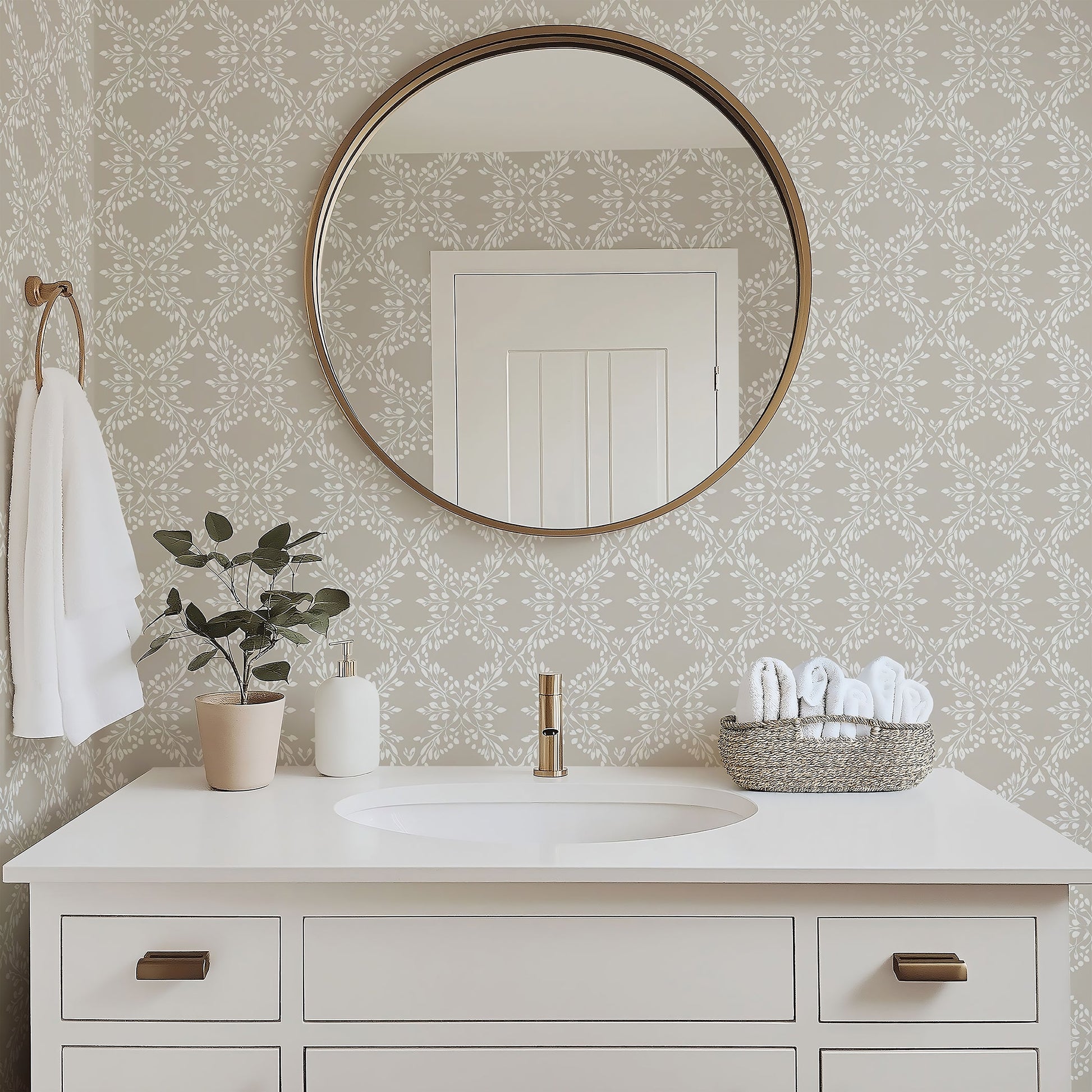 Elegant bathroom with "Whimsical Trellis Melody" wallpaper in gray and white, featuring laurel wreaths and foliage around a vanity mirror.