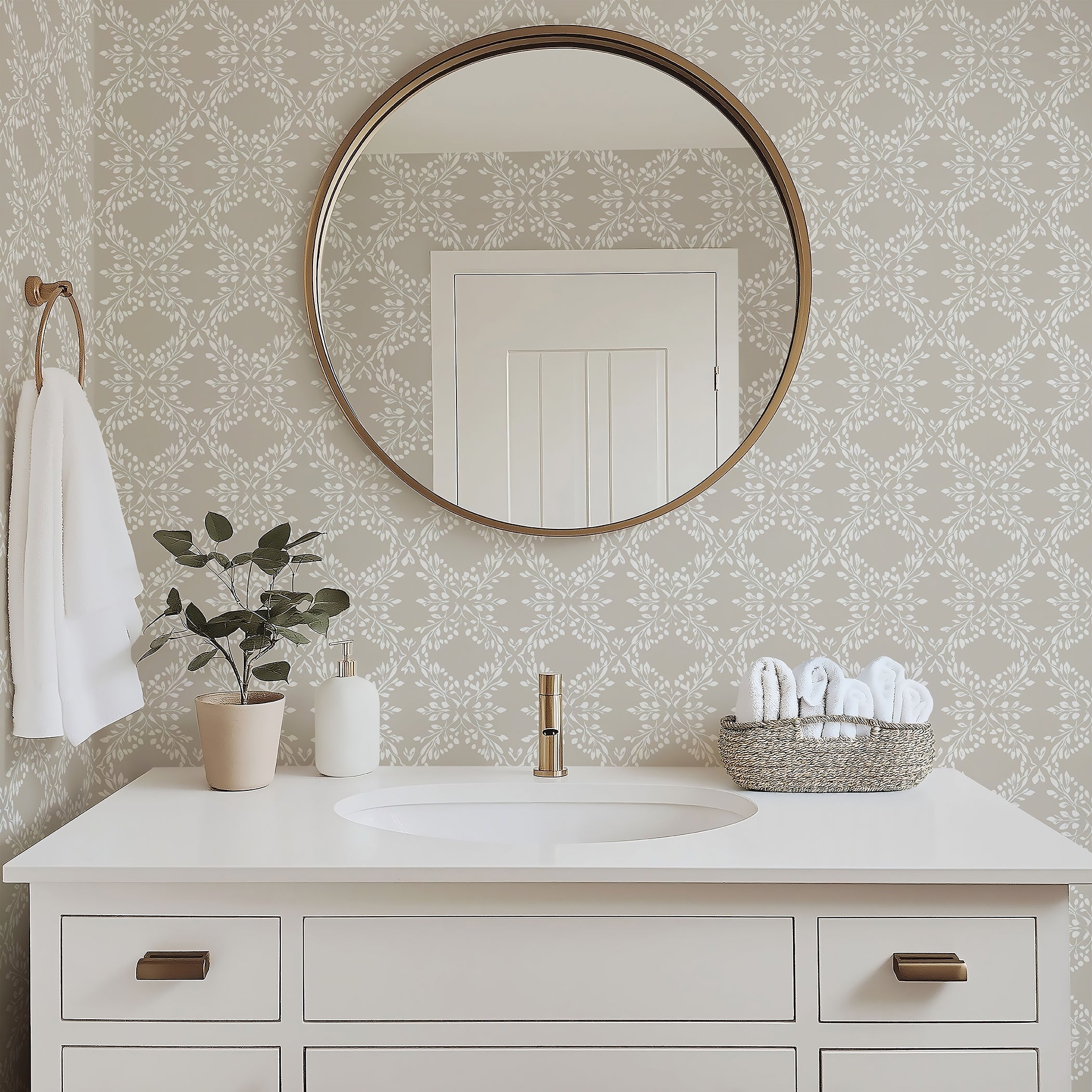 Elegant bathroom with "Whimsical Trellis Melody" wallpaper in gray and white, featuring laurel wreaths and foliage around a vanity mirror.