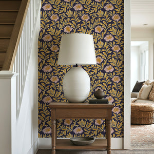 Artisan Garden Charm floral wallpaper with blush blooms and golden foliage on navy background, enhancing traditional spaces.