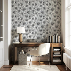 Monochrome floral wallpaper featuring intricate black-and-white flowers in a modern office space.