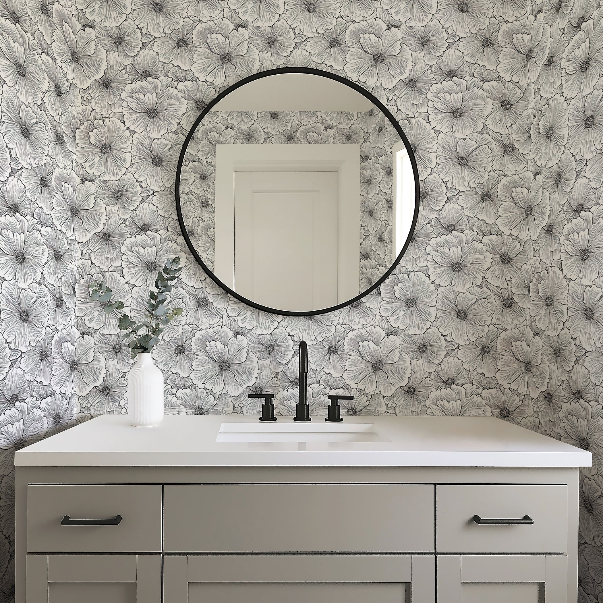 Artisan Flower Lace wallpaper in monochrome floral design, featuring soft black flowers on a white background in a modern bathroom setting.